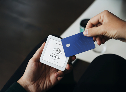 Thumbnail of a payment terminal showing "Payment successful!"